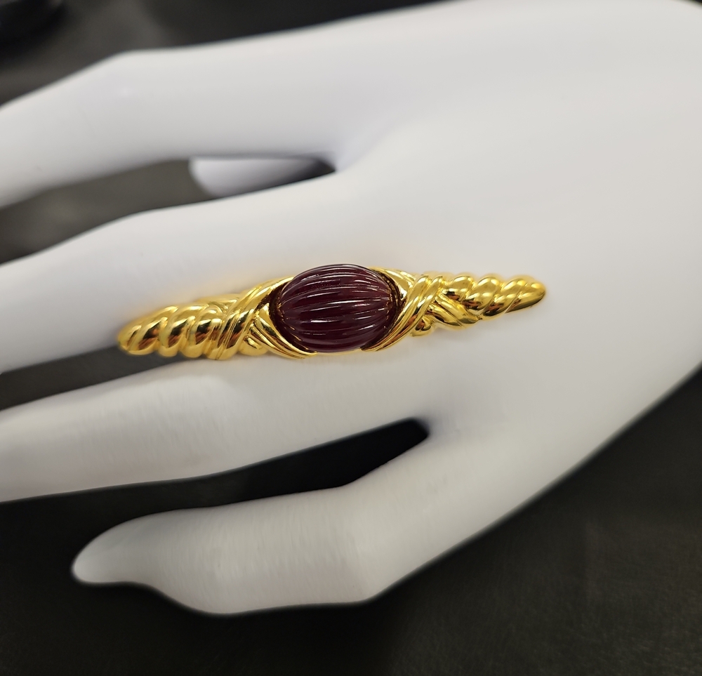 Trifari Gold-Tone Brooch with Ribbed Burgundy Cabochon
